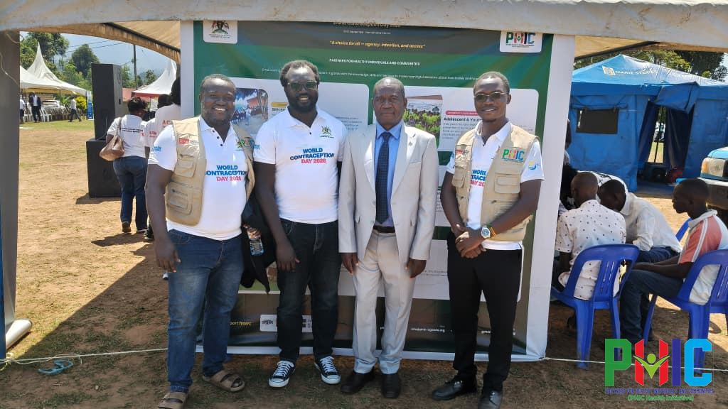 PHIC team with a guest at the PHIC exhibition during World Contraception Day 2026
